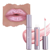 Runway Rogue LuxGloss Catwalk tube shows soft pastel-pink shimmer.