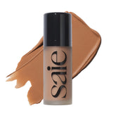 Saie Dew Bronze bottle close-up for grab-and-go radiant glow.