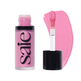 Saie Dew Liquid Blush Baby swatch showing natural rosy glow