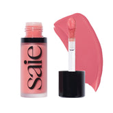 Saie Dew Liquid Blush with chubby doe-foot applicator for precise, buildable color.