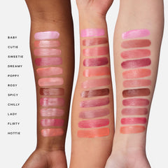 Saie Dew Liquid Blush swatch on apples of cheeks showing dewy finish.