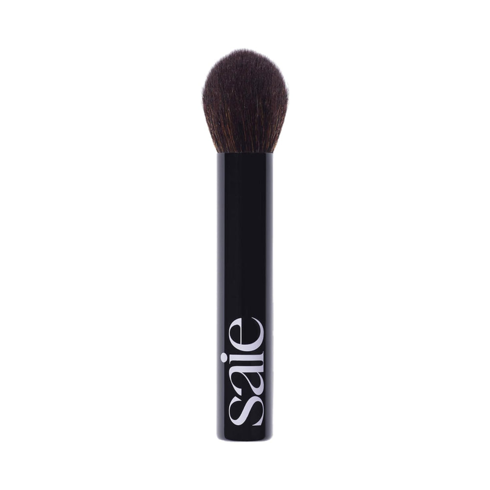 Saie The Fluffy Brush close-up showing soft bristles for even powder application