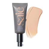 Saie Slip Tint SPF 35 bottle with pump for quick, natural coverage.