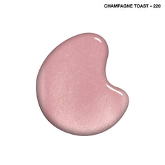 Nails closeup reveals sheer pink shimmer with diamond strength protection