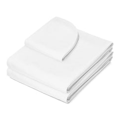 Saloniture fitted sheet on a massage table provides secure fit and neat appearance.