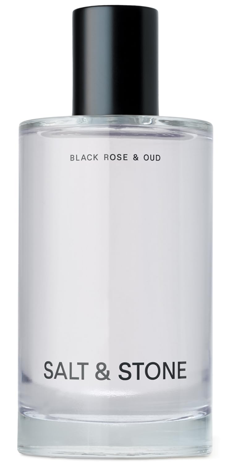 Salt & Stone Black Rose Oud bottle pour showing dark floral fragrance moment