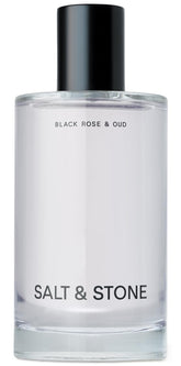 Salt & Stone Black Rose Oud bottle pour showing dark floral fragrance moment
