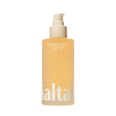 Saltair Body Oil bottle pour showing luxurious salt water vanilla fragrance and quick absorption.