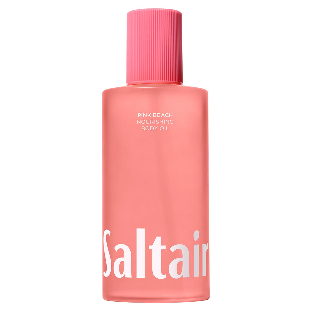 Saltair Body Oil Pink Beach bottle pour showing quick-absorb hydration.