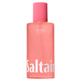 Saltair Body Oil Pink Beach bottle pour showing quick-absorb hydration.