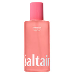 Saltair Body Oil Pink Beach bottle pour showing quick-absorb hydration.