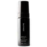 SALTYFACE tanning foam on full body for a natural, transfer-free glow.