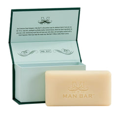 Close-up of Siberian Fir Man Bar texture showing moisturizing cream on skin.