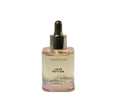 Sand and Fog Love Potion bottle showcases premium parfum oil for long-lasting wear.
