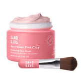 Sand and Sky pink clay mask packaging with included brush for easy at-home spa treatment.