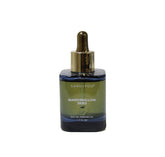 Sand + Fog Marshmallow Skies bottle in dark-blue glass with gold cap for elegant daily fragrance.