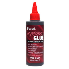 Sassi Eyelash Glue Dark 2oz bottle close-up for precise, durable lash bond.