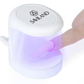 SAVILAND mini UV nail lamp shows one-finger design ideal for quick gel cures on the go