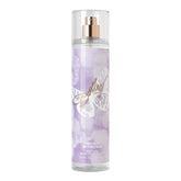 Dolly Parton Smoky Mountain bottle on purple background for travel ready fragrance