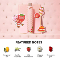 Scentbird Strawberry Shortcake EDP bottle with fresh strawberries.