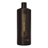 Sebastian Dark Oil Lightweight Shampoo bottle showcases a nourishing formula for shine.