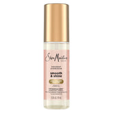 SheaMoisture Aceite Coco Hibisco, bote derramando, aporta hidratación y brillo al cabello.