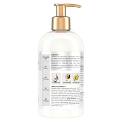 Textura cremosa de SheaMoisture, acondicionador con coco virgen que suaviza y desenreda.