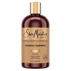 Botella SheaMoisture Manuka Honey Mafura Shampoo para rizos hidratados.