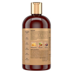 Espuma cremosa de Shampoo SheaMoisture para limpieza suave.