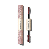 SHEGLAM All-In-One mascara application close-up showing burgundy shade for bold color payoff.