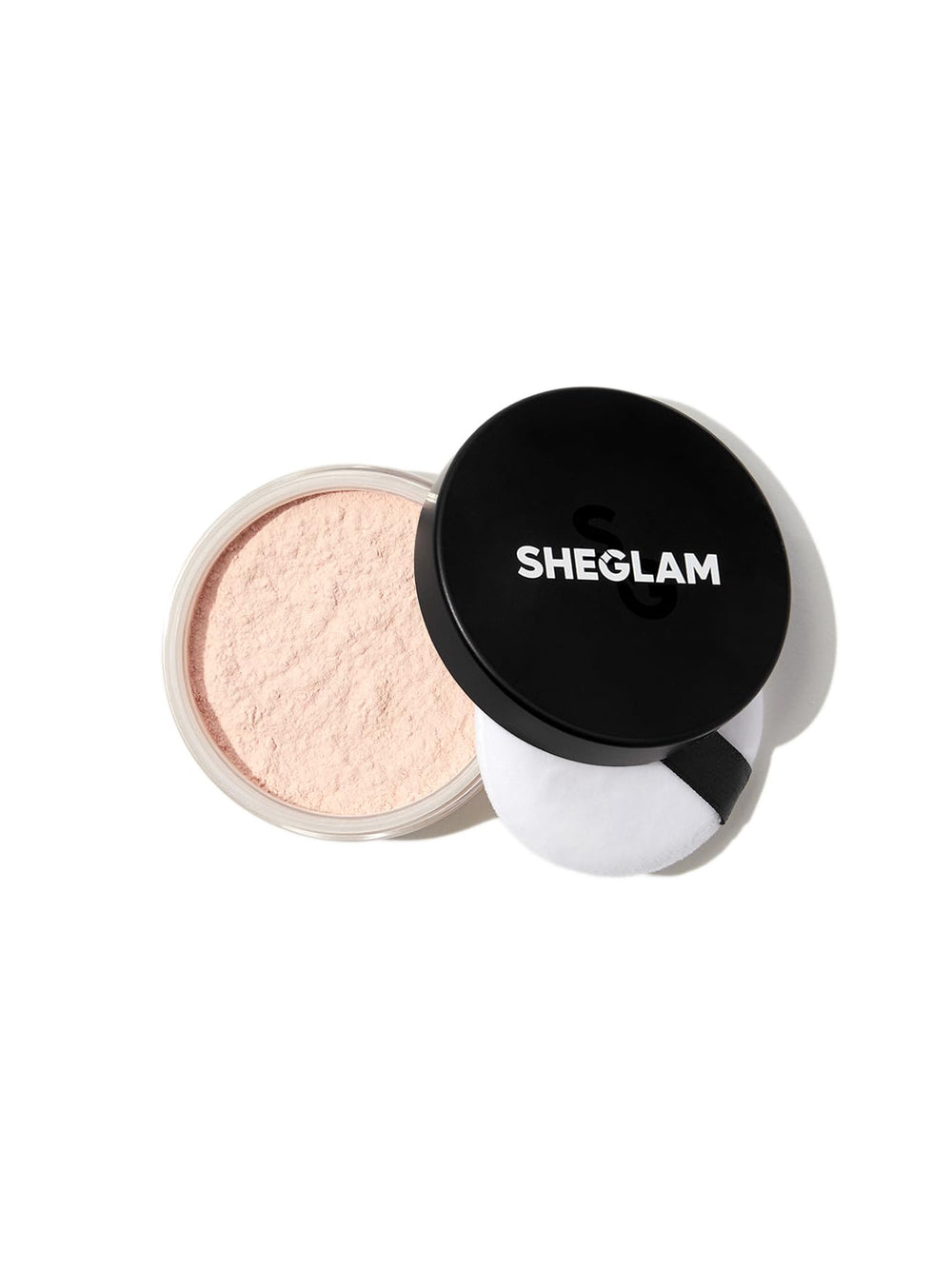 SHEGLAM Baked Glow Setting Powder: envase cercano con control de aceite.