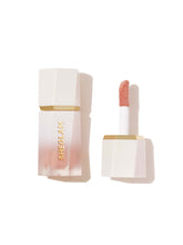 SHEGLAM Glow Bloom highlighter bottle catches light for dewy radiance