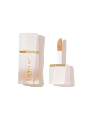SHEGLAM Glow Bloom Tea Cake highlighter bottle for a dewy, radiant cheek glow.