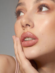 SHEGLAM Lip Dazzler Kit application brush in use for precise lines.