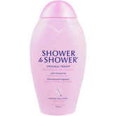 Shower To Shower Original Fresh Powder bottle on vanity for all-day confidence.