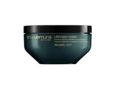shu uemura art of hair bottle close-up showing rich hydration for damaged hair.