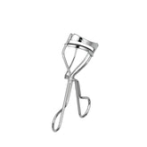 Shu Uemura New Eyelash Curler W closeup highlighting smooth curling action