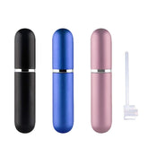 SHxxyljh travel atomisers in black, blue, and champagne for easy packing.