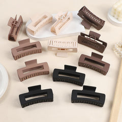 Pinza grande Sisiaipu marrón oscuro para cabello rizado, sujeción segura.