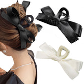 Sizobi bow claw clip black close-up shows satin bow detail and secure grip