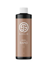 SJOLIE Rapid Spray Tan bottle close-up highlighting olive-base formula for a natural glow