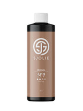 SJOLIE No. 9 spray tan bottle shown for easy, even application.