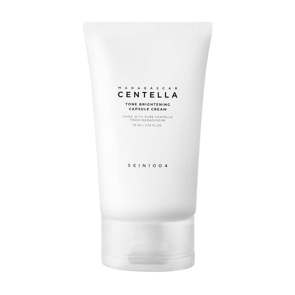 SKIN1004 Tono Brillo Capsula Crema, enfoque visual: textura suave que ilumina naturalmente.