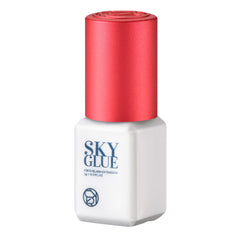 Sky S+ glue bottle at a lash station with tools, ideal for professional lash artists.