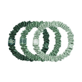Slip ivy skinny scrunchie closeup shows luxe silk texture for gentle hold.