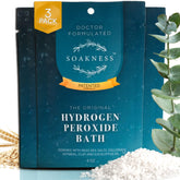 Soakness: botella vertiendo peróxido de hidrógeno para baño revitalizante