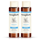 Soapbox Argan Shampoo botella, control suave del frizz y brillo natural.