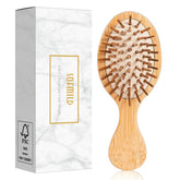 Sofmild mini detangling brush with bamboo bristles for all hair types; gentle detangling on wet hair.