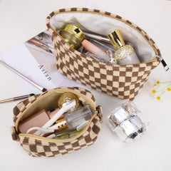 SOIDRAM makeup bag with metal zipper keeps items secure and visible.