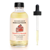 Soothing House Strawberry Shortcake Body Oil bottle shows rich hydration for soft, glowing skin